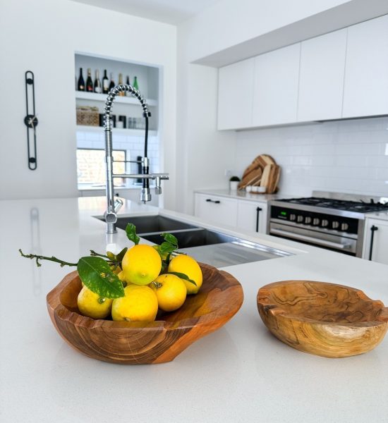 wooden bowl of lemons